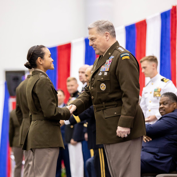 Cadet shaking hand on stage